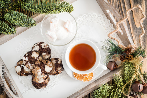 Chocolate cookies. Cookie with cracks. Cracked chocolate biscuits. Christmas chocolate cookies. Christmas biscuits. Chocolate cookies with cracks. photo