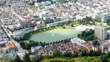 Aerial view of Lille Lungegardsvannet (Smalungeren) lake in the centre of Bergen city, beautiful landscape, sunny day, Hordaland county, Norway