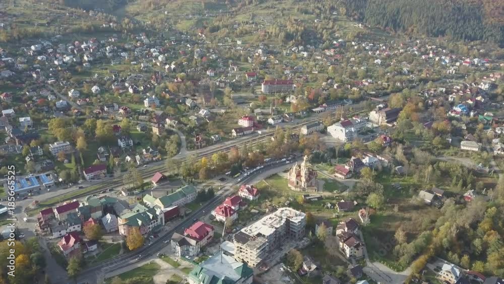 Aerial view to autumn carpathian city Yaremche at sunny day, Ukraine Aerial view to autumn carpathian city Yaremche at sunny day, Ukraine