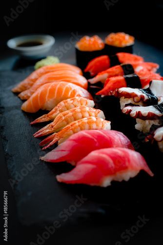 Set of Sushi & Sasimi on black stone plate