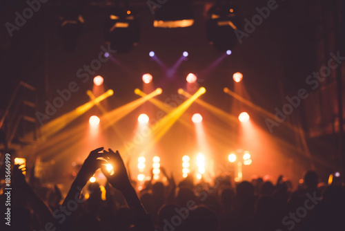 applause and raised hands at concert. Nightclub life