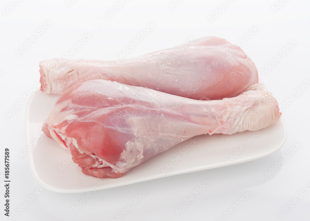 skinless turkey drumsticks isolated on white skinless turkey drumsticks isolated on white