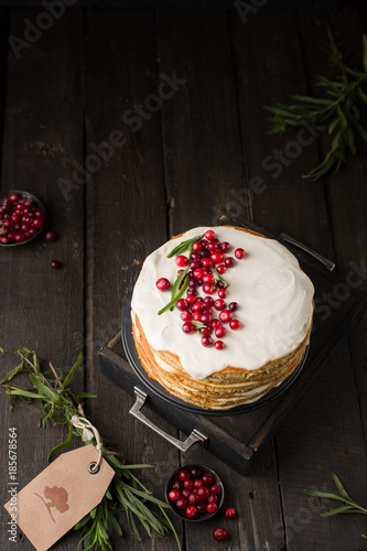 Honey nut ginger and carrot cake decorated with cranberries and rosemary. Perfect Christmas baked goods that you want to eat!)