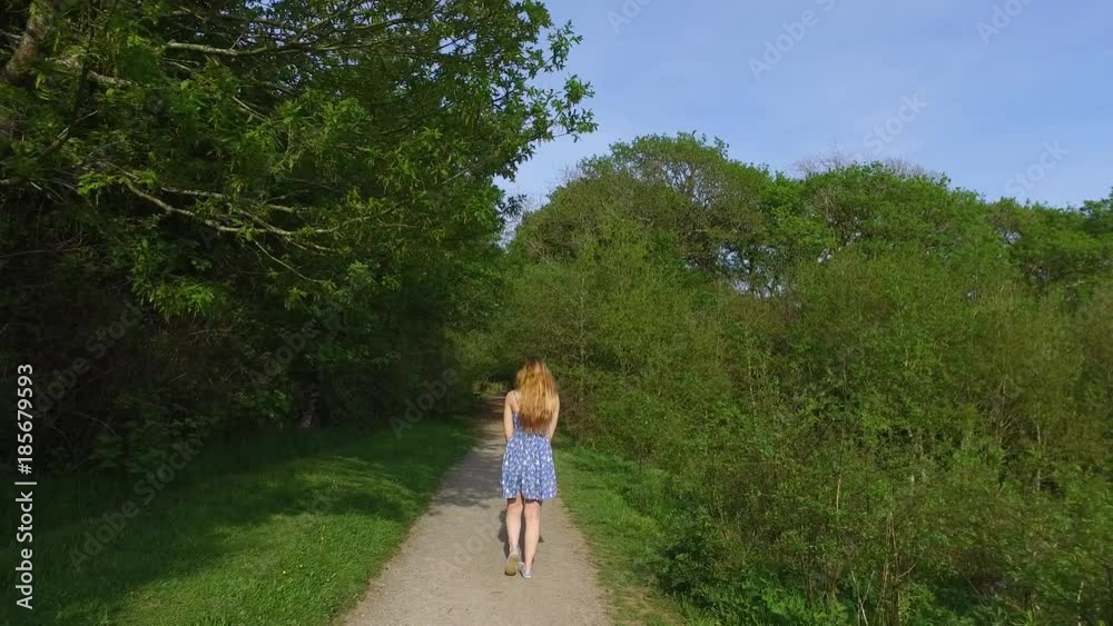 Beautiful young woman exploring the great outdoors Beautiful young woman exploring the great outdoors