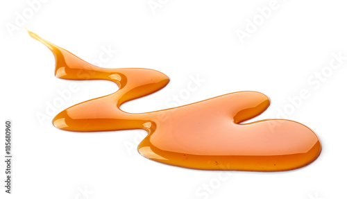 Bild auf Leinwand caramel sauce on white background