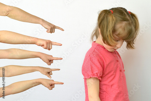 Schilderij op canvas many hands are pointing fingers at the child ,kid of the outcast conceptual phot