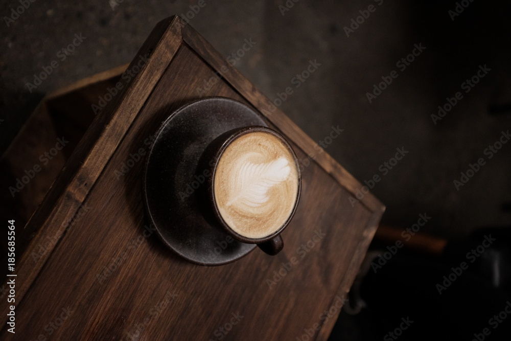 Cappuccino on wooden table
