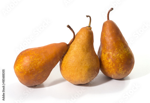 Ripe juicy yellow pears are isolated on a white background