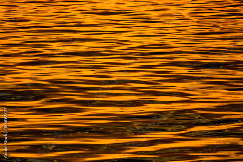 Sea at sunset water shining