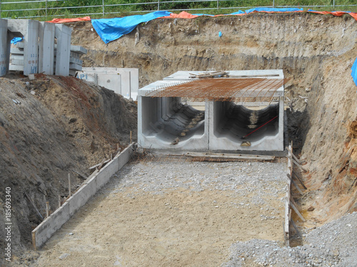 Underground precast concrete drainage under construction at the construction site in Sendayan, Malaysia.  photo