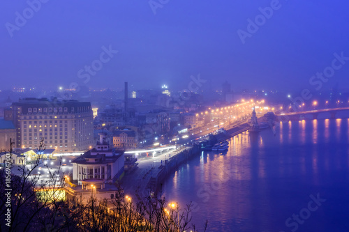 View of the night Kiev, Dnieper River, River station and the historic district of Podil