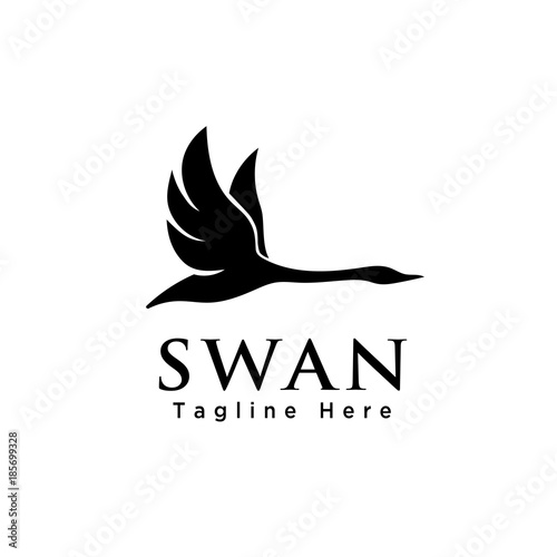 Fototapeta Naklejka Na Ścianę i Meble -  simple Silhouette flying swan logo