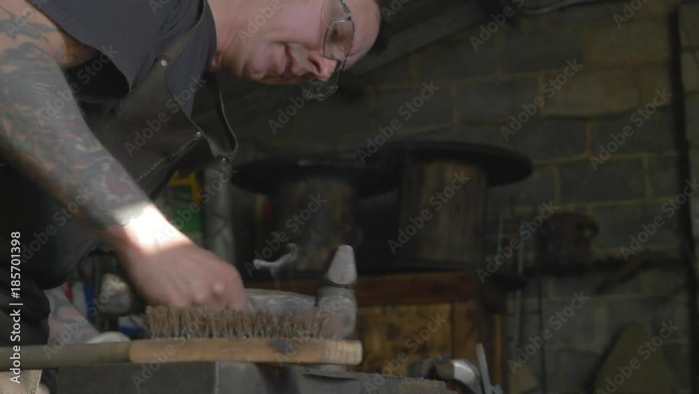 Blacksmith working on his latest creation Blacksmith working on his latest creation