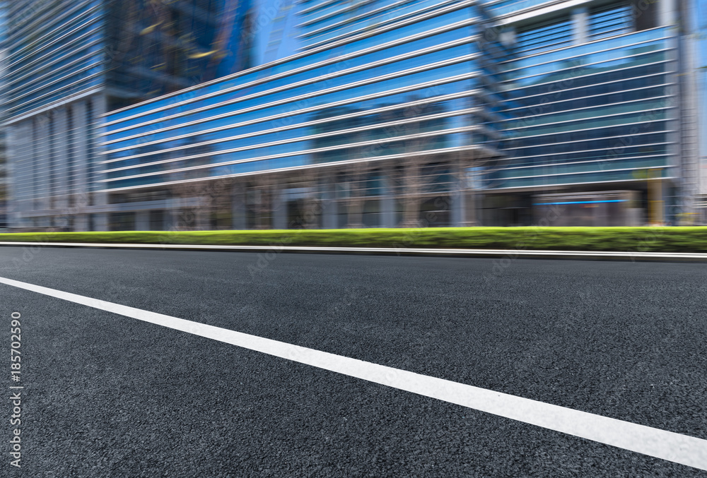 empty urban road with modern building in the city. empty urban road with modern building in the city.