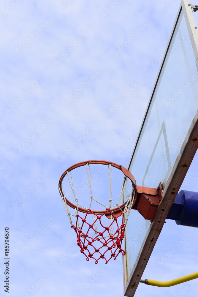 Basketball shooting under the blue sky, close-up