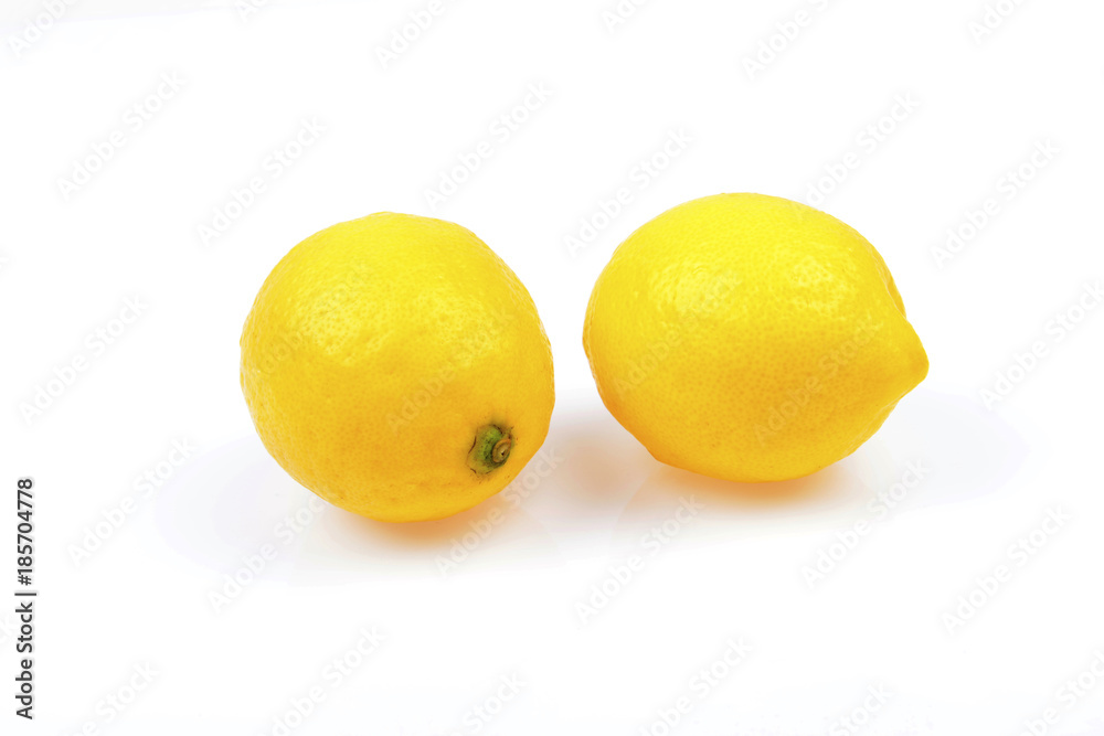 Two fresh lemon isolated on a white background Two fresh lemon isolated on a white background