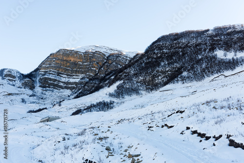 Snow covered mountains peaks, winter mountains