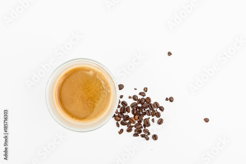Cold Dried Coffee Beans Next To Hot Coffee Drink Top View