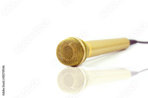 Microphone Gold on isolated white. Entertainment and sound concept