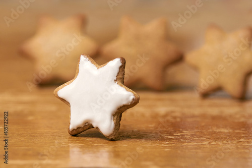 White sweet glaze. Gingerbread Cookie. Blurred Background