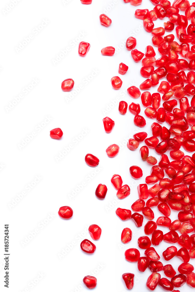 frame of Pomegranate seeds on white background frame of Pomegranate seeds on white background
