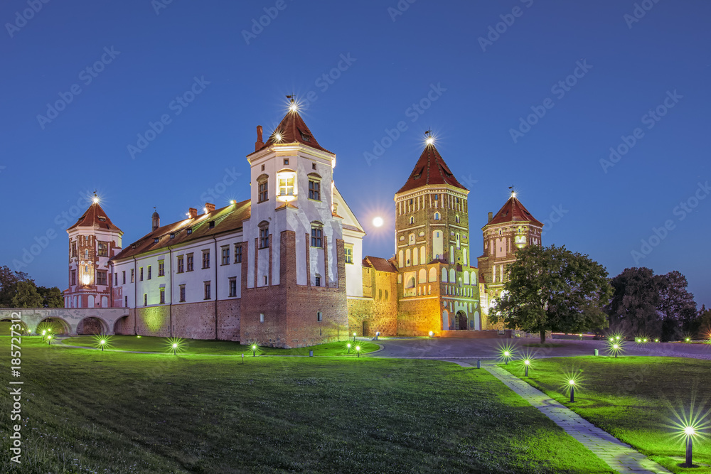 Travel Places and Torist Destinations. Picture of Renowned Mir Castle as Former Bastion and Fortress of The Great Lithuanian Kingdom, Present Belarus.Shot During Blue Hour