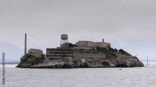 a tracking slow motion shot of the infamous alcatraz island in san francisco bay
