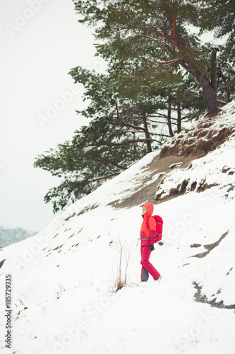 Woman tourist in winter mountains