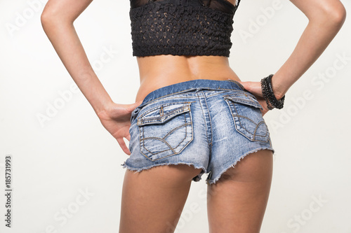 Принти на полотні Woman wearing denim short shorts