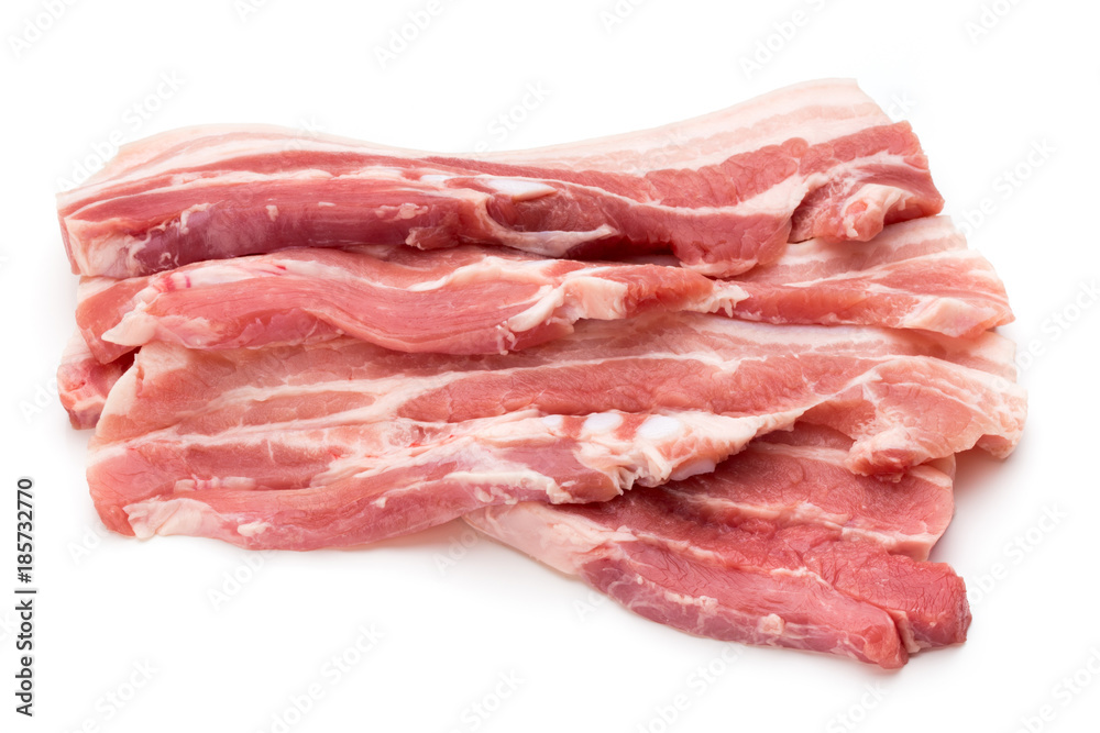 Meat pork slices isolated on the white background. Meat pork slices isolated on the white background.