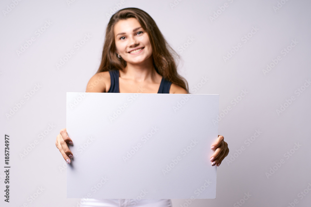 White background. Girl with poster White background. Girl with poster
