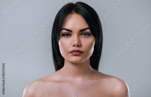 Beautiful woman on grey background