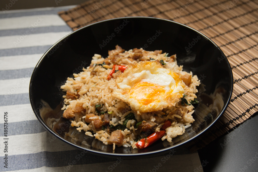 Thai basil fried rice with fried egg.