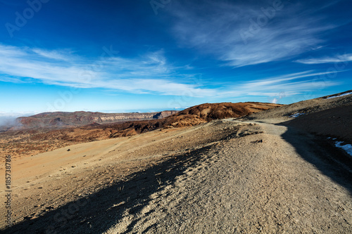 Teide National Park, Tenerife, Canary Islands - Gravel footpath of the Montana Blanca volcanic ascent trail. This scenic hiking path leads up to the 3718 m Teide Peak, the highest peak in Spain.