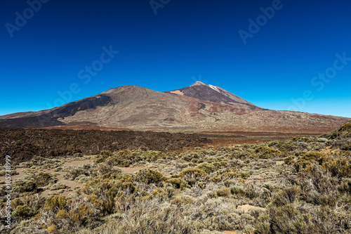 Teide National Park, Tenerife, Canary Islands - A picturesque view of the colourful Teide volcano, or in spanish 'Pico del Teide'. The tallest peak in Spain with an elevation of 3718 m.