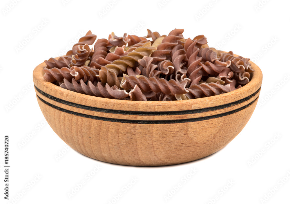 Obraz premium Dark fussili pasta in bowl