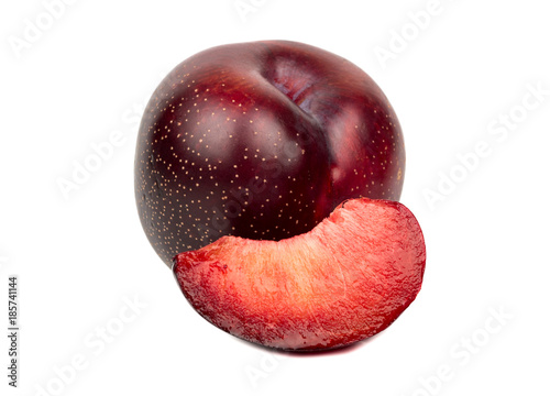 Red plum with slice