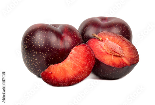 Red plum with slice