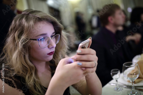 Teen with smartphone