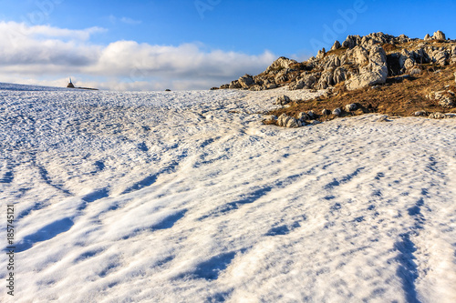 Beautiful scenic snowy winter Caucasus mountain blue sky landscape. Abadzesh Pass in Lagonaki, Russia