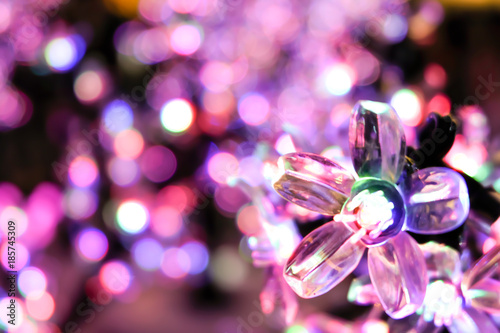Blurred of flowers LED lights on tree with blurred  background. Selective focus
