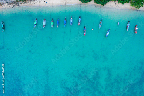 Aerial view of the beach with long tail boat