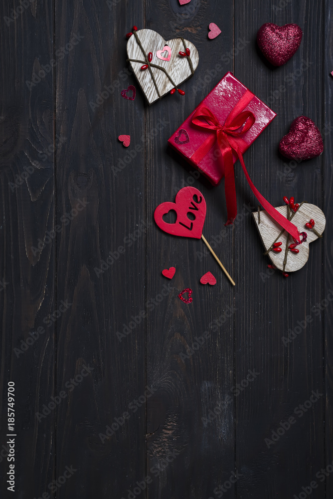 Gift box with red bow ribbon and wooden heart Gift box with red bow ribbon and wooden heart