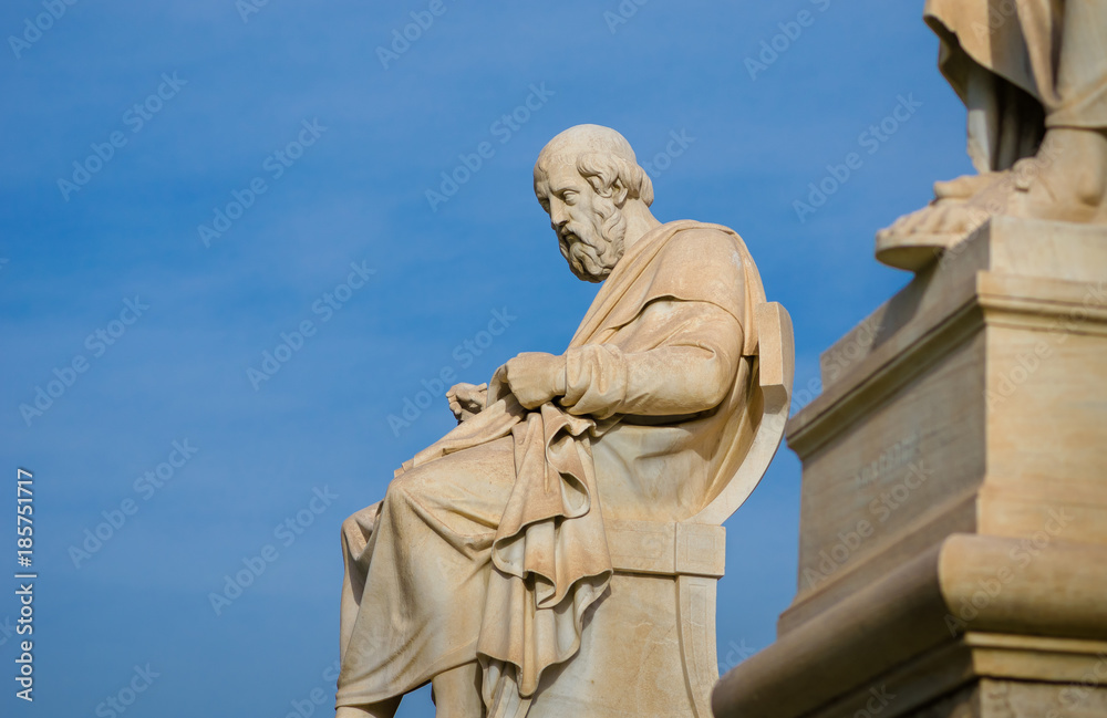 Marble statue of the of the great philosopher of antiquity Plato on background the sky. 