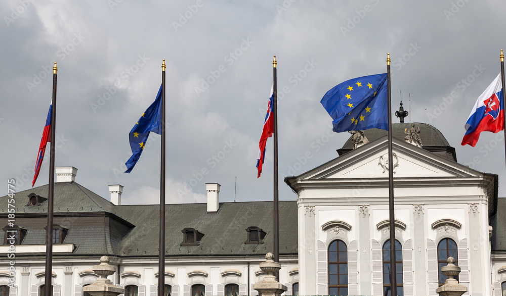 Fototapeta premium Flags in front of Grassalkovich palace. Bratislava, Slovakia.