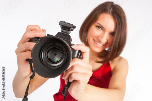 Girl with a camera. The gir...