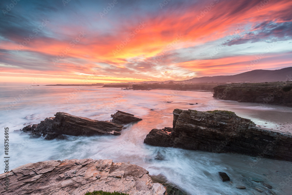 Obraz premium colored winter sunrise on the Galician coast, on the Las Islas beach
