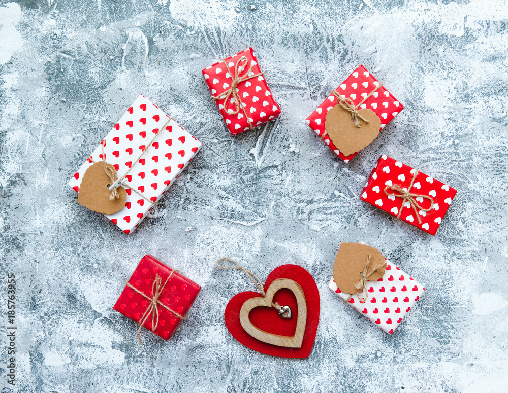 Fototapeta premium Love heart and gift boxes on vintage background, valentines day card concept .