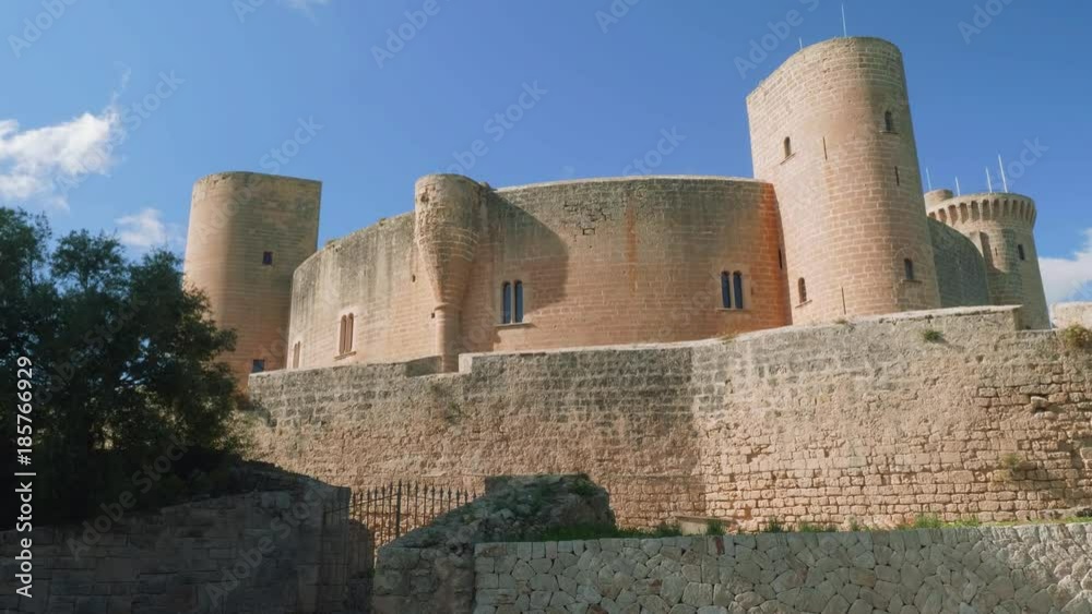 Nice view of Bellver castle in Palma de Majorca with blue sky on background Nice view of Bellver castle in Palma de Majorca with blue sky on background