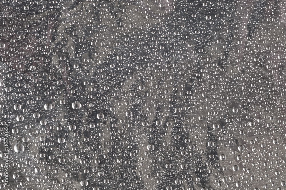 Texture of water drops on a metal background